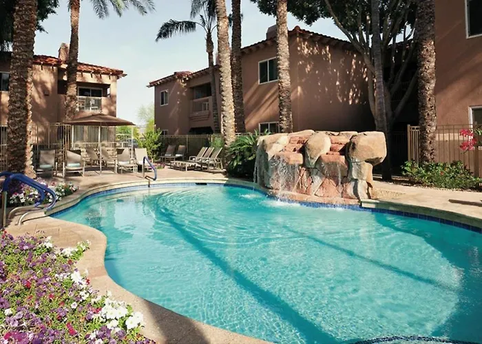 Enjoy Two Outdoor Pools In Setting 1bd